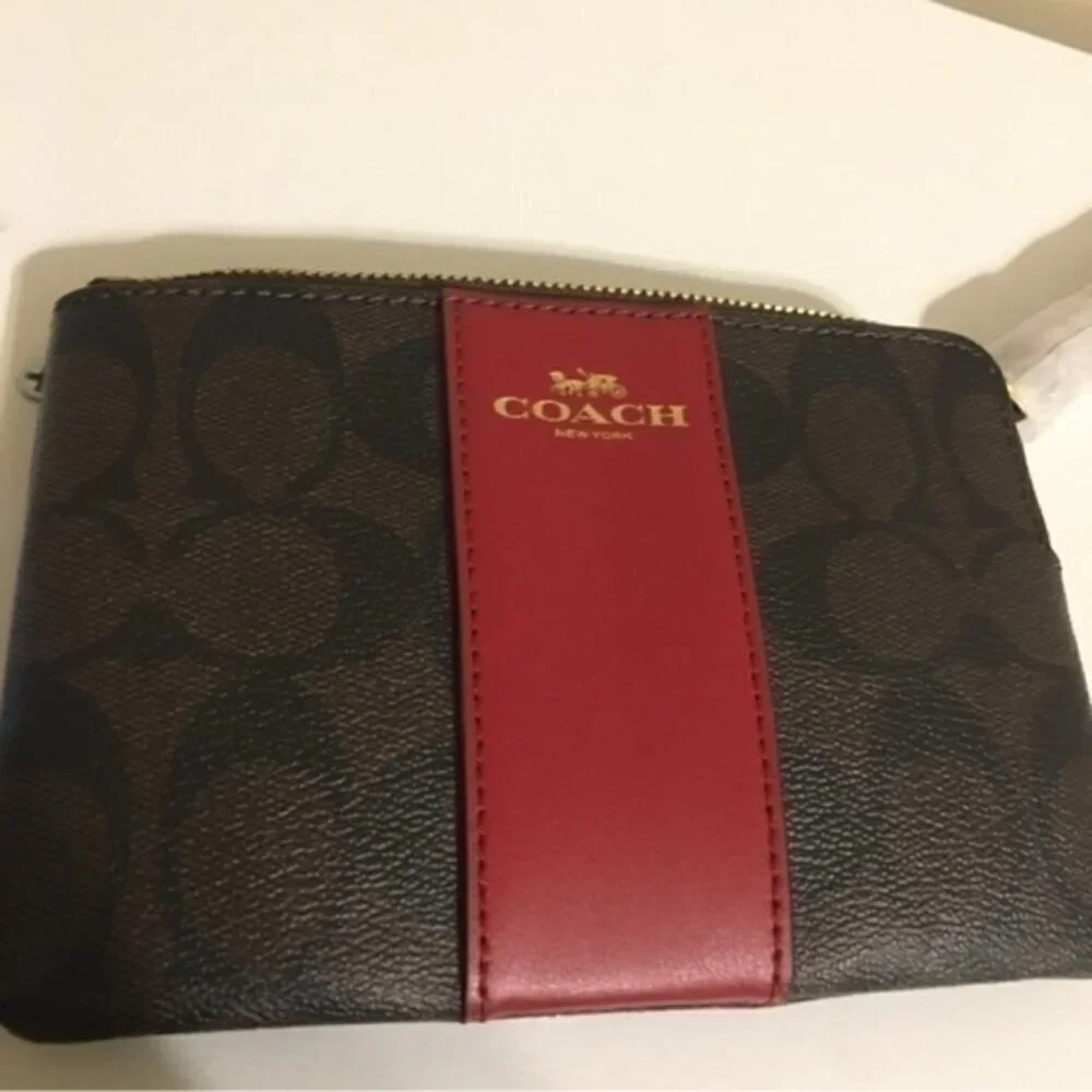 Coach signature coated canvas wristlet